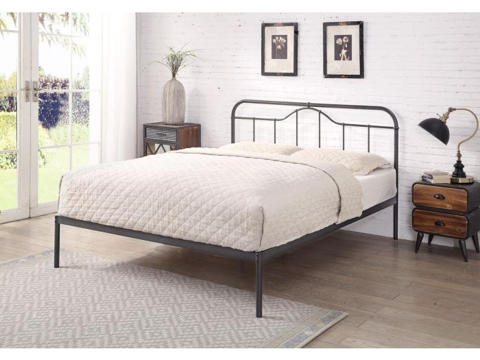 Black and silver metal bed frame with a curved headboard and low foot end. Elegant, minimal design