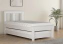 Contemporary white finish guest bed with pull out under bed. Slatted headboard with a plinth top. Low foot end with a plinth top.